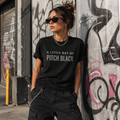 Black graphic T-shirt with the phrase "A Little Ray of Pitch Black," a funny sarcastic unisex tee styled for casual streetwear and everyday fashion.